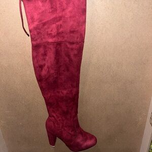 Red thigh high heeled boots